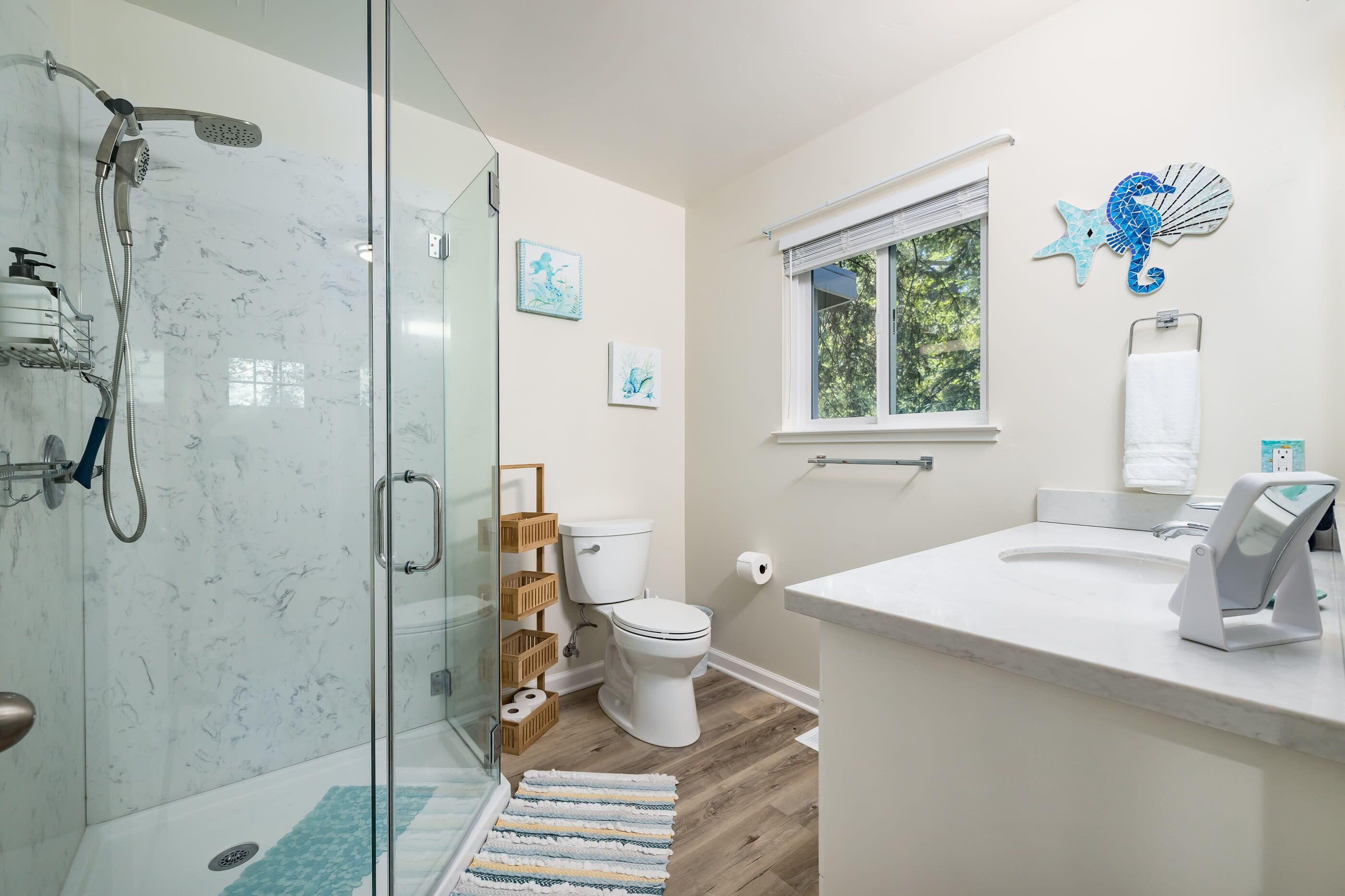Shower, hair dryer, towels, shampoo