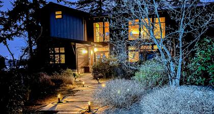 Waterfront dream with luxe finishes, 2 suites, home theater & amazing views