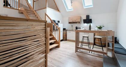 Ferienwohnung 'Appartment Waldloft' mit Bergblick, privater Terrasse und WLAN