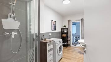 Shower, hair dryer, towels