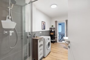 Shower, hair dryer, towels