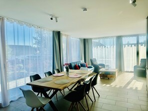 Dining - Exclusive 5-room maisonette architect's house with panoramic lake view and penthouse roof terrace (Öhningen)