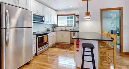 Dog-friendly home in the perfect location with enclosed yard, streaming, & W/D