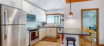 Dog-friendly home in the perfect location with enclosed yard, streaming, & W/D