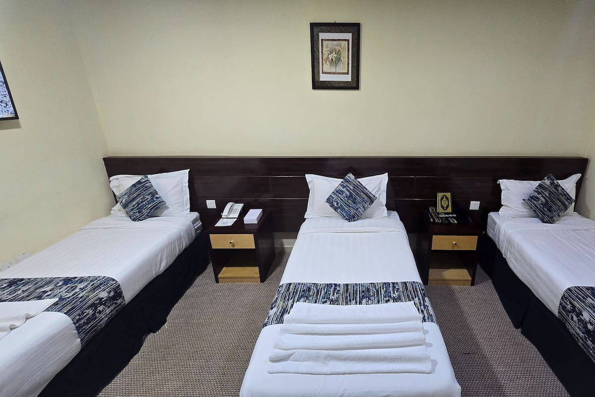 Luxury Triple Room | Premium bedding, down duvets, pillow-top beds, minibar