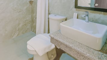 Deluxe Twin Room | Bathroom | Hair dryer, slippers