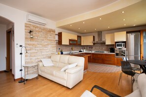 Appartement Deluxe | Salle de séjour