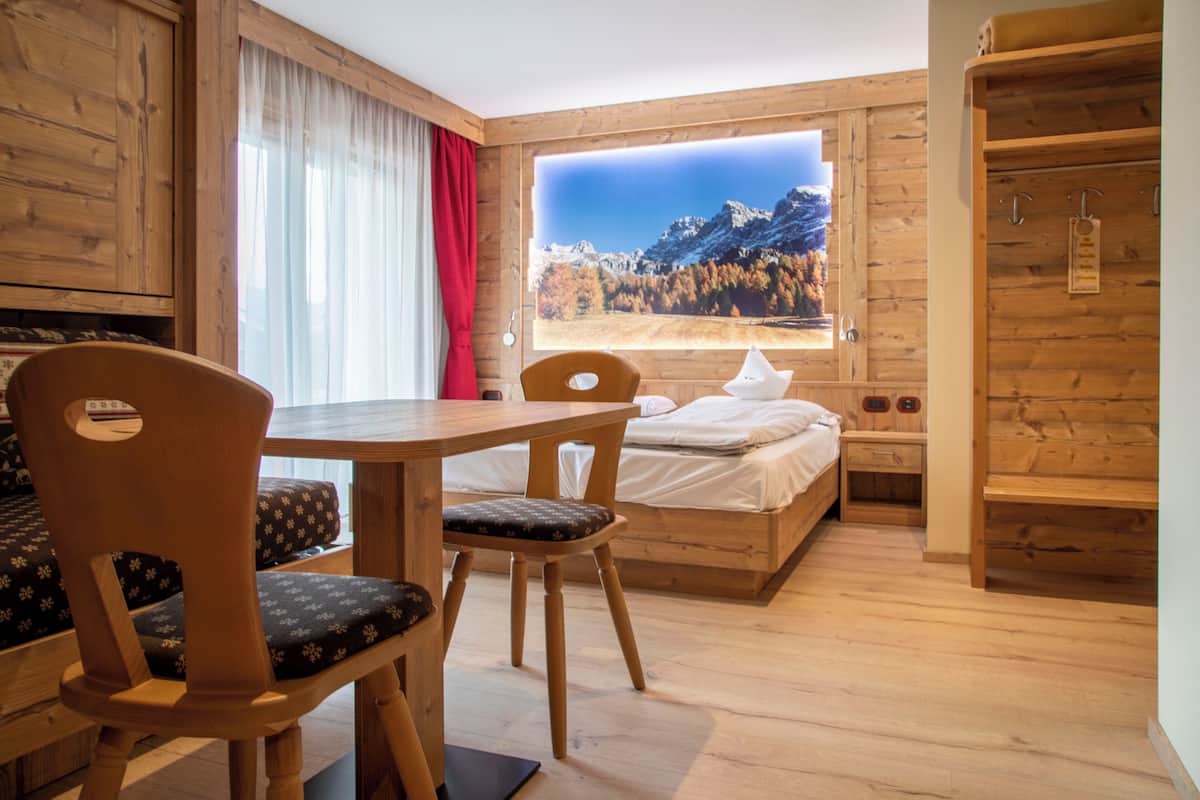 Junior Suite | 1 camera, biancheria da letto di alta qualità, copriletto in piuma