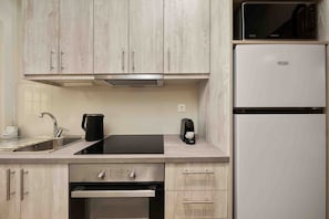 Comfort Apartment | Private kitchen | Fridge, microwave, oven, electric kettle - Yard Studio by Corfuescapes  (Corfu)