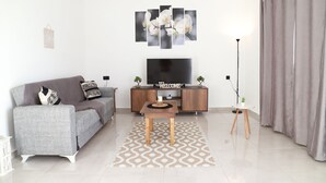 Family Apartment | Living room | Flat-screen TV - Calma Eco Houses (Santorini)