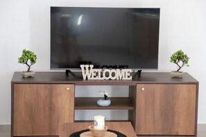 Family Apartment | Television - Calma Eco Houses (Santorini)
