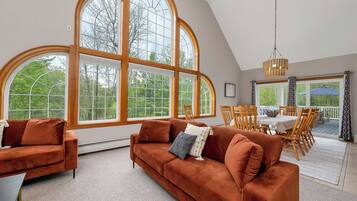 Smart TV, fireplace, table football, books