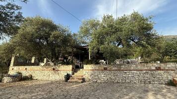 Breakfast, lunch, dinner served; local cuisine, garden views