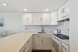 Microwave, dishwasher, coffee/tea maker, toaster