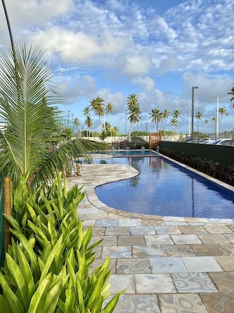 8 indoor pools, open 8:00 AM to 10:00 PM, pool umbrellas, sun loungers
