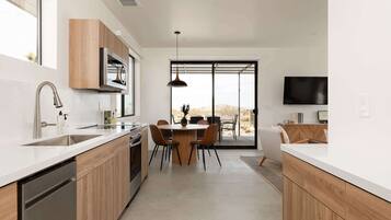View of the galley style kitchen
