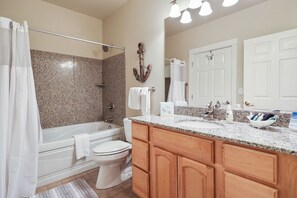 Jetted tub, hair dryer, towels