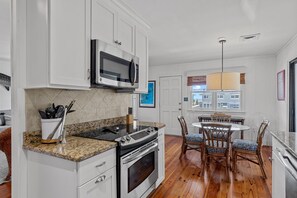 Fridge, microwave, oven, stovetop - Joyner Cottage-Oceanside Home in Atlantic Beach, NC (Atlantic Beach)