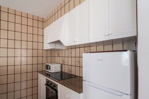 Fridge, microwave, coffee/tea maker, toaster