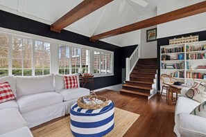 Smart TV, fireplace, books, video library