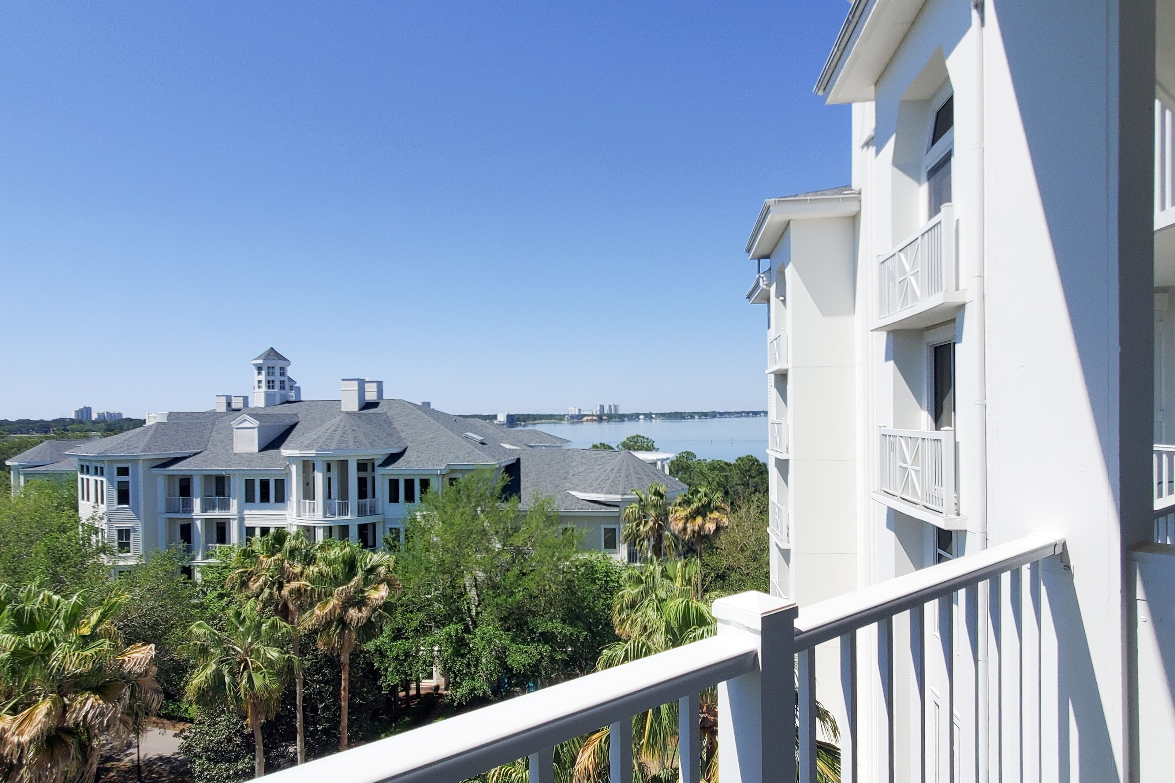 Sound-view condo with balcony, outdoor pool, tennis, & bikes - snowbird-friendly