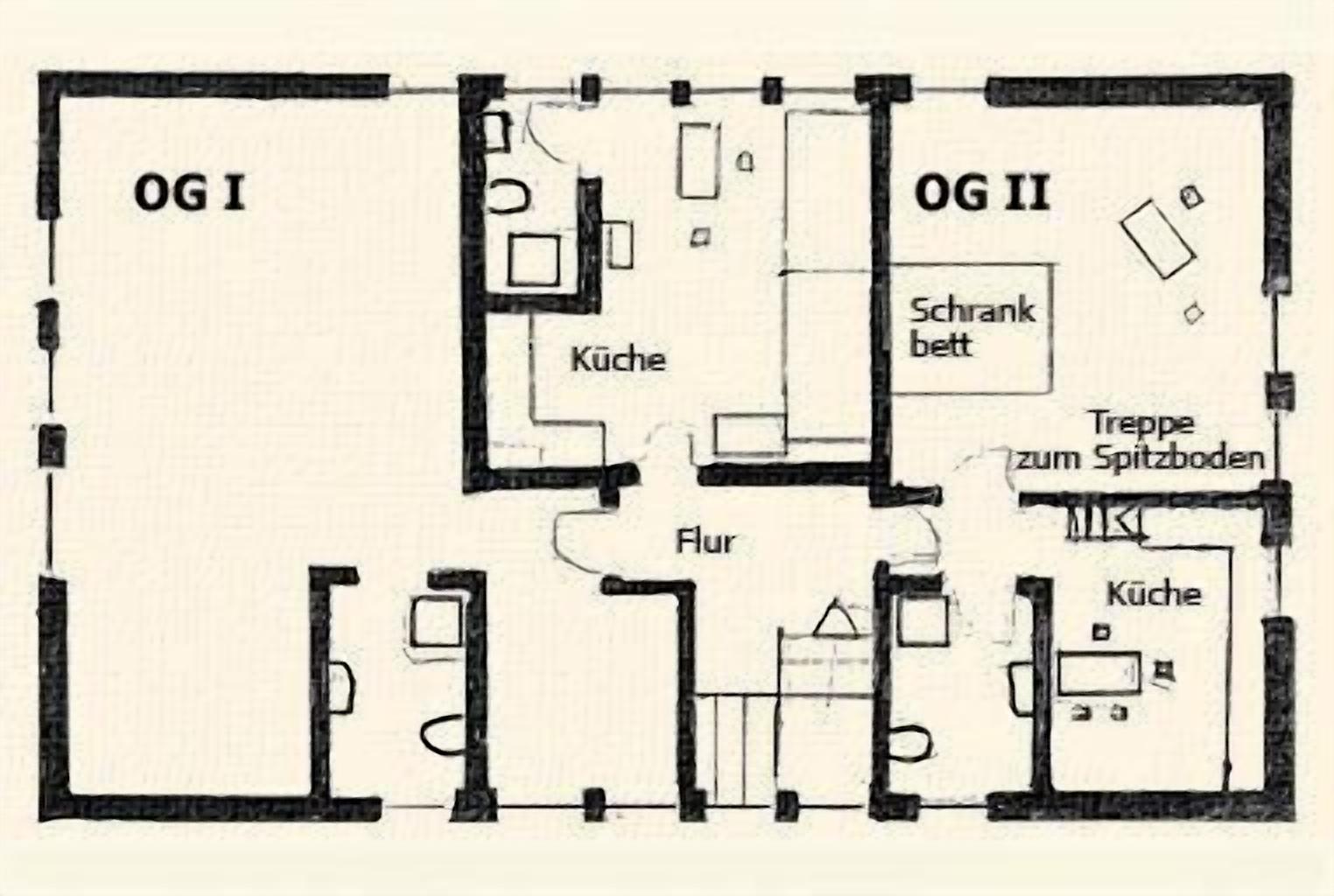 Un plan d’étage comprenant deux chambres (OGI et OGII), une salle de bain, une cuisine, un coin repas et un salon.