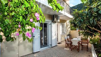 Superior Apartment, Garden View | Terrace/patio