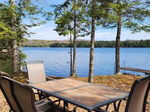 Outdoor dining - Cabin with private peninsula on Presque Isle Chain of Lakes! (Presque Isle)