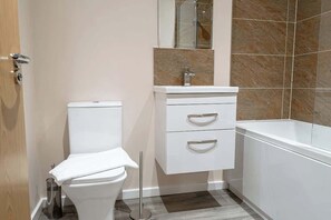 Shower, hair dryer, shampoo
