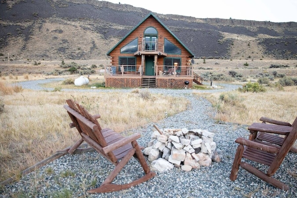 This beautiful river front cabin sits on six and a half acres right on the Yellowstone River in gorgeous Paradise Valley, Montana.