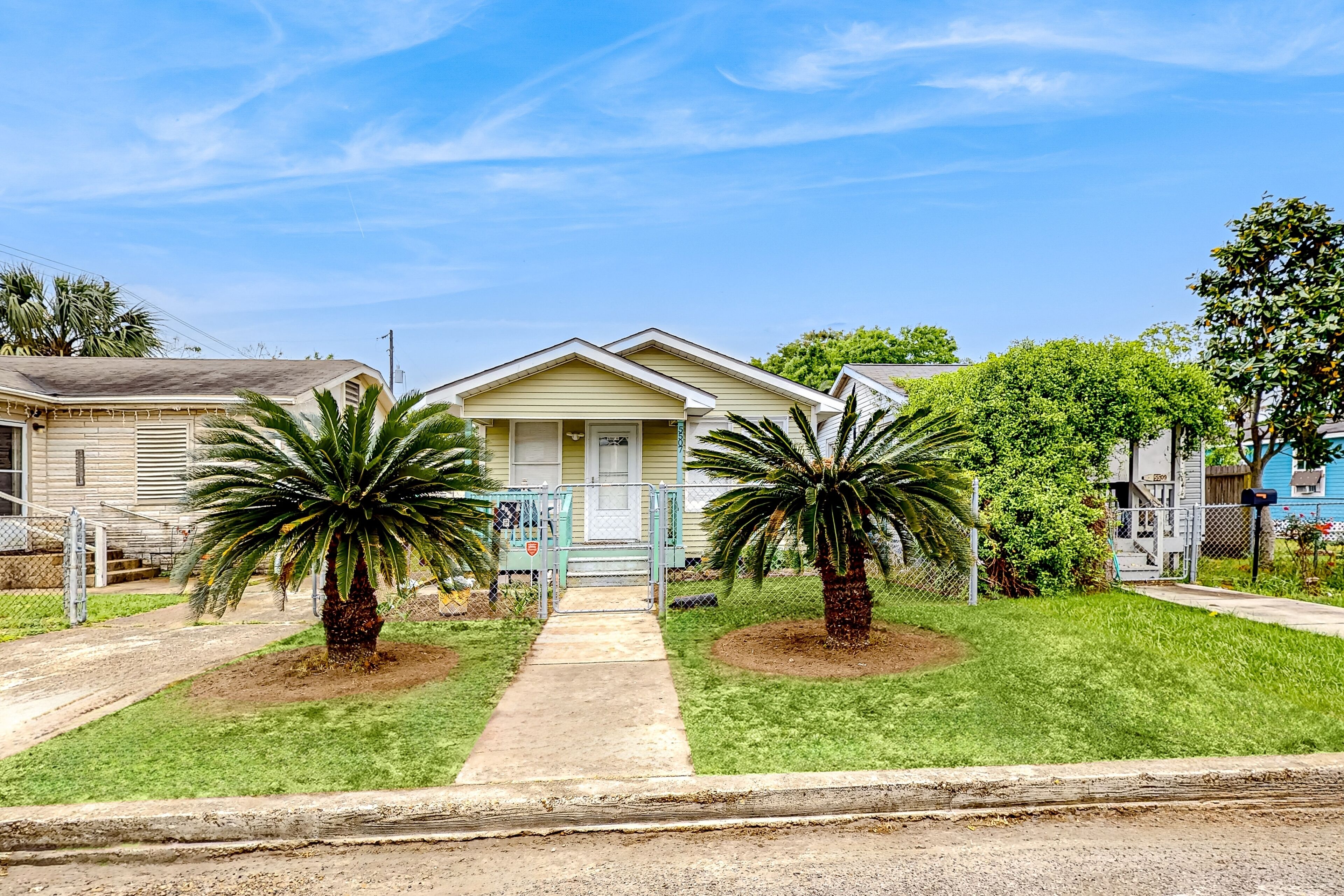 Charming single-level getaway with a fenced yard, washer/dryer, central AC
