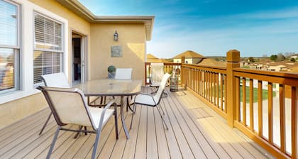 Spacious condo with balcony, patio, games, fireplace, W/D, & AC