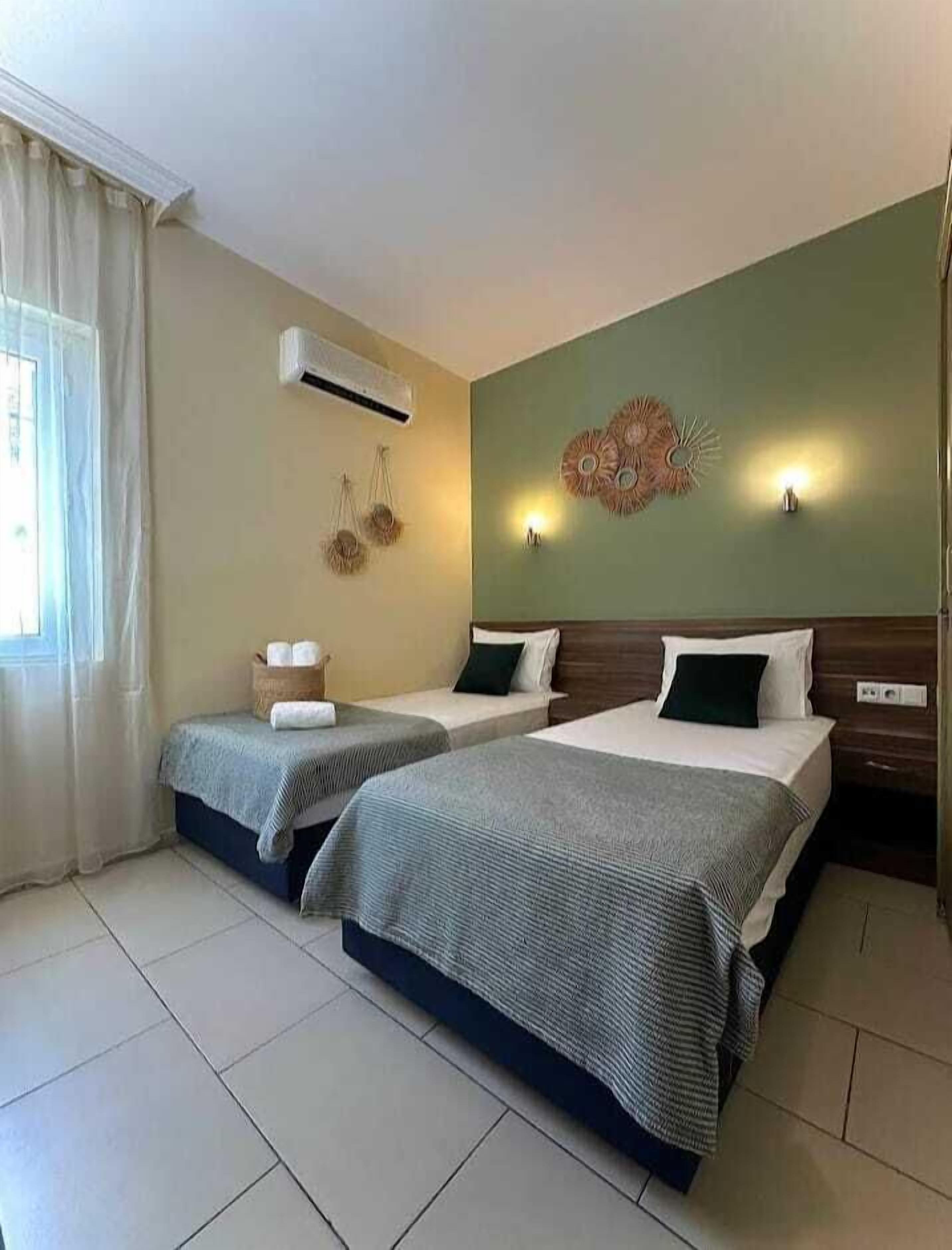Economy Twin Room, Courtyard View, Ground Floor | Free WiFi, bed sheets