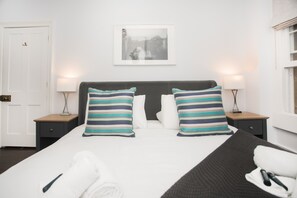 2 dormitorios, tabla de planchar con plancha, wifi y ropa de cama