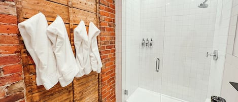Signature Loft, Multiple Beds | Bathroom | Designer toiletries, hair dryer, towels, soap
