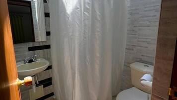 Shower, towels, soap, shampoo