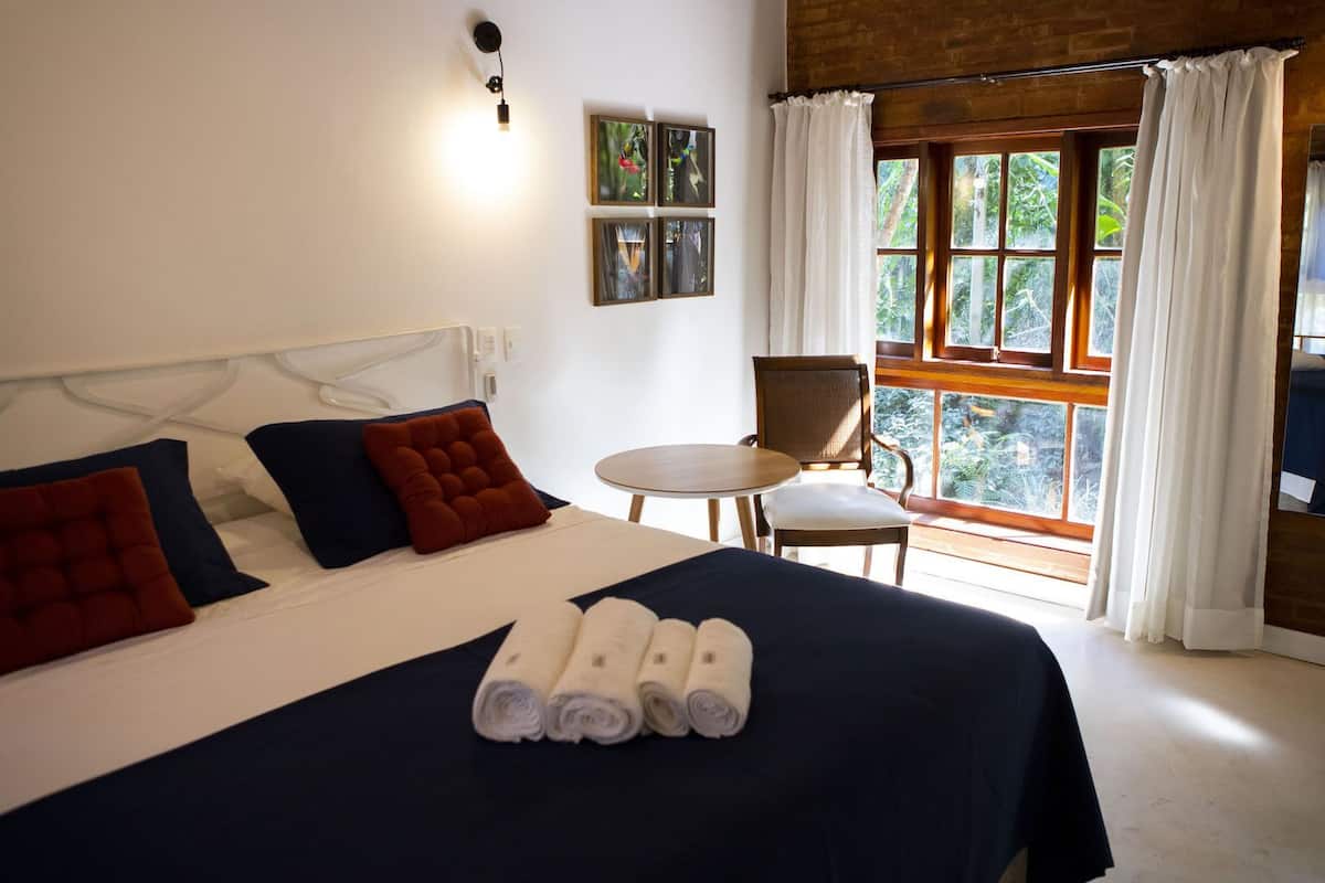 Camera Premium con letto matrimoniale o 2 letti singoli, lanai, vista giardino | 1 camera, Wi-Fi gratuito, lenzuola