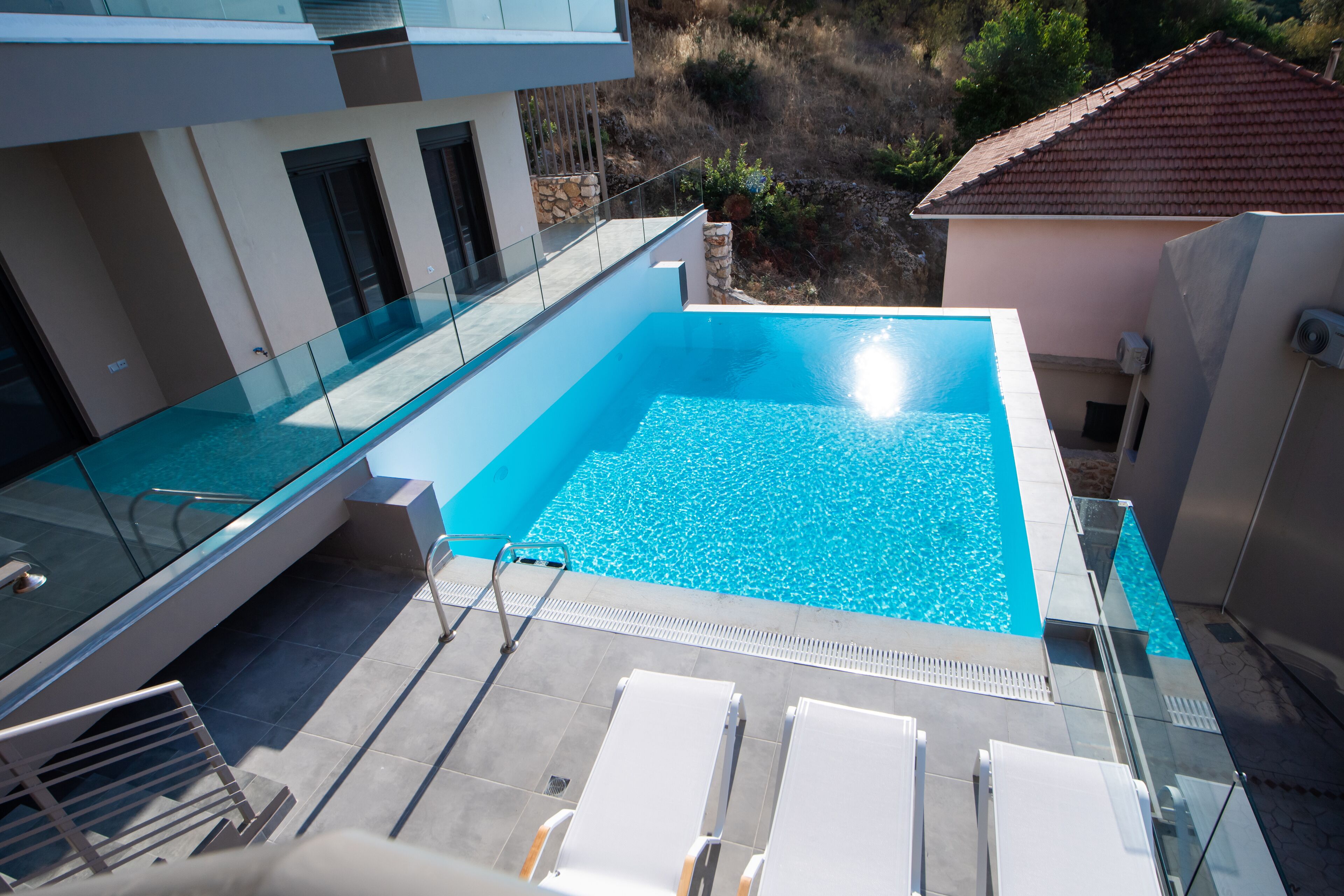 2 outdoor pools, open 8:00 AM to 9:30 PM, sun loungers