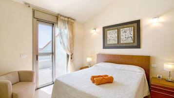 2 slaapkamers, een strijkplank/strijkijzer, gratis wifi, beddengoed