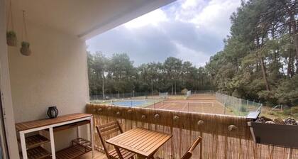 Apartamento 'Appartement Au Parc De La Grange' con piscina compartida y balcón