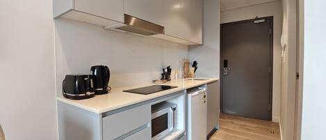 Microwave, stovetop, toaster, cookware/dishes/utensils