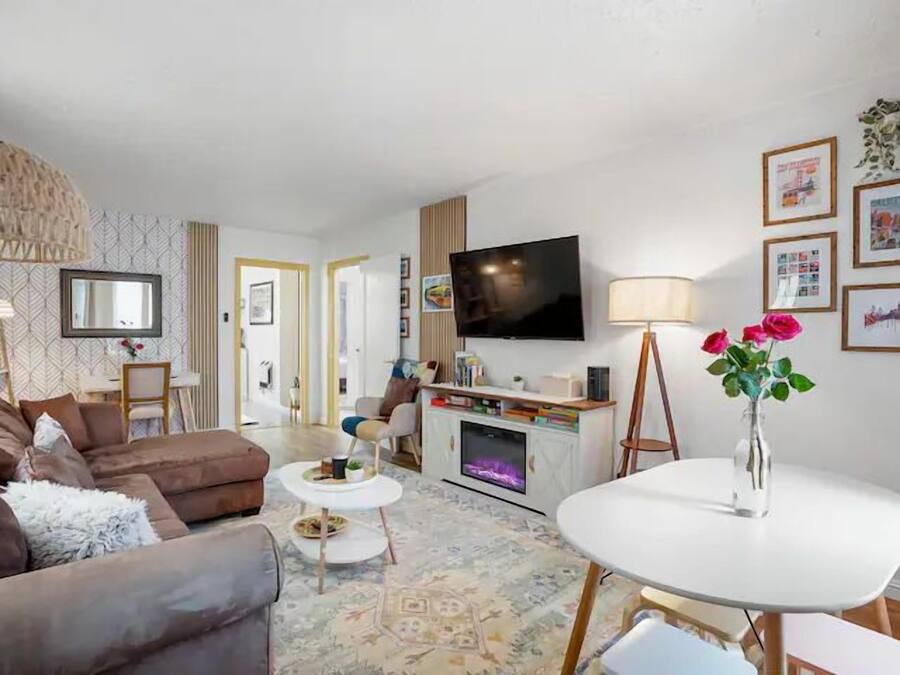 Deluxe Apartment, 2 Bedrooms, Private Bathroom, Beachside | Living area | 55-inch flat-screen TV with digital channels