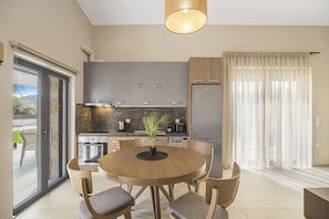 Luxury Villa | Private kitchen | Full-sized fridge, microwave, oven, stovetop