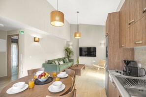 Deluxe Villa | Living area | 43-inch Smart TV with digital channels - Stone and Sea Villas (Lefkada)