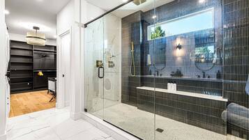 Shower, eco-friendly toiletries, hair dryer, towels