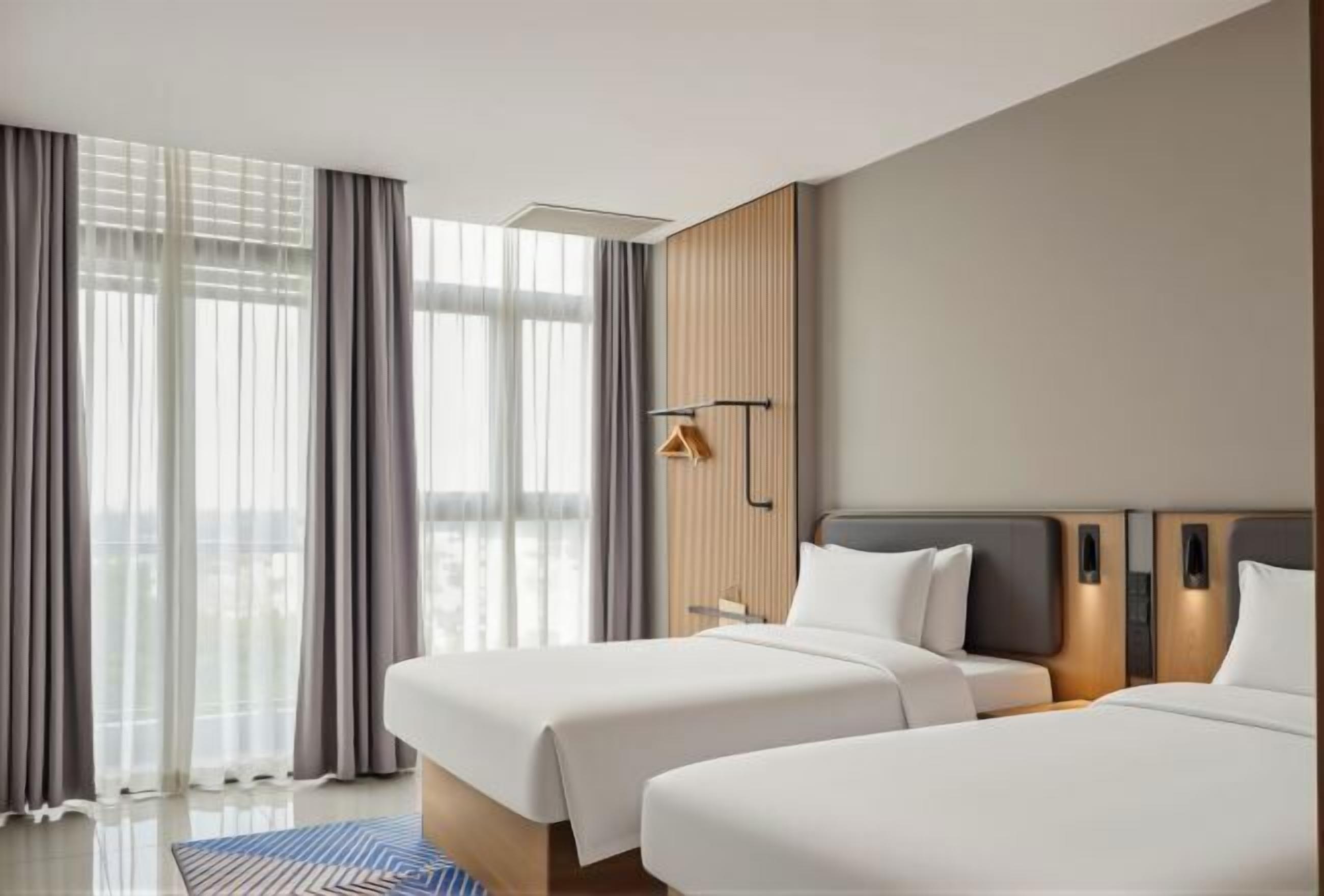 Premium bedding, down duvets, Tempur-Pedic beds, free minibar items
