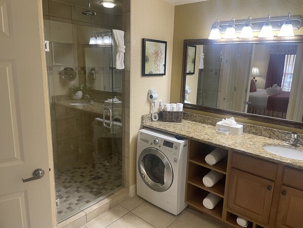 Shower, jetted bath, hair dryer, towels