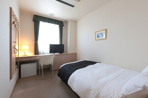 Quarto solteiro, para fumantes | 1 quarto, Wi-Fi de cortesia, roupa de cama