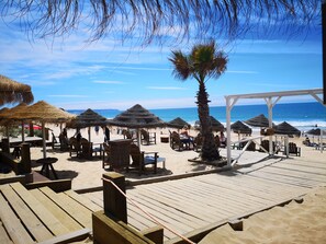 Sun-loungers, beach towels