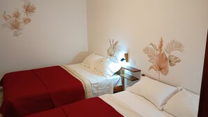 2 dormitorios, tabla de planchar con plancha, wifi gratis y ropa de cama